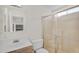 Bathroom with a single sink vanity, toilet, and walk-in shower at 6461 S Oakmont Dr, Chandler, AZ 85249