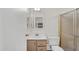 Bathroom with a single sink vanity, toilet, and walk-in shower at 6461 S Oakmont Dr, Chandler, AZ 85249