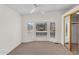 Bedroom featuring neutral carpeting, white walls, and a bay window at 6461 S Oakmont Dr, Chandler, AZ 85249