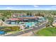 Aerial view of the complex showing the pool, parking, golf course, and community amenities at 6461 S Oakmont Dr, Chandler, AZ 85249