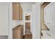 Convenient laundry area with storage cabinets and a washer/dryer set at 6461 S Oakmont Dr, Chandler, AZ 85249