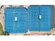 Overhead view of four outdoor blue tennis courts at 6461 S Oakmont Dr, Chandler, AZ 85249