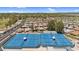 Bright blue tennis courts in a well-maintained community offering recreational opportunities for residents at 6461 S Oakmont Dr, Chandler, AZ 85249