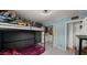 The bedroom features a bunk bed, patterned wallpaper, and closet space at 7543 E Portland St, Scottsdale, AZ 85257