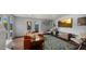 Bright living room with tile flooring and sliding glass doors to backyard at 7543 E Portland St, Scottsdale, AZ 85257