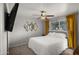 Comfortable main bedroom with ceiling fan and plush carpet at 7543 E Portland St, Scottsdale, AZ 85257