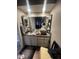 Bathroom vanity with framed mirror, updated countertop, and ample storage space at 7725 W Mcrae W Way, Glendale, AZ 85308
