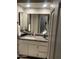Bathroom vanity with granite countertop and updated cabinetry at 7725 W Mcrae W Way, Glendale, AZ 85308