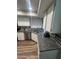 Kitchen featuring stainless steel appliances, granite countertops, and updated cabinetry at 7725 W Mcrae W Way, Glendale, AZ 85308
