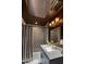 Bathroom featuring a white vanity, framed mirror, and a shower/tub combo at 8049 E Serene St, Carefree, AZ 85377