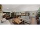 Spacious living room with a seamless flow to other living areas, hardwood flooring, and an inviting atmosphere at 8049 E Serene St, Carefree, AZ 85377
