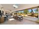 Spacious covered patio featuring an elegant dining area and views of the desert landscape at 8049 E Serene St, Carefree, AZ 85377