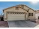Charming single-story home featuring a two-car garage and a well-maintained stucco exterior and desert landscaping at 8566 N 108Th Ln, Peoria, AZ 85345