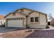 Charming single-story home with desert landscaping, featuring a two-car garage and a well-maintained stucco exterior at 8566 N 108Th Ln, Peoria, AZ 85345