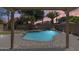 Expansive backyard with lush landscaping, charming patio, and refreshing backyard pool for outdoor living at 1037 E Baylor Ln, Gilbert, AZ 85296
