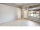 Inviting entryway boasts vaulted ceilings, a picture window, and plenty of natural light at 1037 E Baylor Ln, Gilbert, AZ 85296