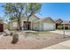 Charming single-story home featuring a low-maintenance yard and a spacious two-car garage at 1037 E Baylor Ln, Gilbert, AZ 85296