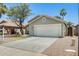 Charming single-story home featuring a low-maintenance yard and a spacious two-car garage at 1037 E Baylor Ln, Gilbert, AZ 85296