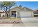 Charming single-story home featuring a well-maintained yard and a spacious two-car garage at 1037 E Baylor Ln, Gilbert, AZ 85296