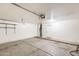 Spacious two-car garage with concrete flooring and ample room for storage at 1037 E Baylor Ln, Gilbert, AZ 85296