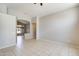 Bright and airy living room with neutral tile flooring and lots of natural light at 1037 E Baylor Ln, Gilbert, AZ 85296