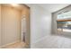 Bright living room with tile flooring and large windows offers natural light at 1037 E Baylor Ln, Gilbert, AZ 85296