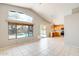 Open-concept living area showcases bright kitchen and views of the backyard pool at 1037 E Baylor Ln, Gilbert, AZ 85296