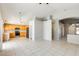 Open concept living space features a kitchen with stainless appliances and spacious layout at 1037 E Baylor Ln, Gilbert, AZ 85296