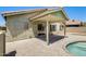 A covered patio extends living space outdoors, next to backyard pool at 1037 E Baylor Ln, Gilbert, AZ 85296
