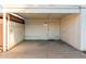 A covered carport with a door at 10516 W Peoria Ave, Sun City, AZ 85351