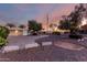 Wide circular driveway with front yard landscaping and partial home exterior at 10516 W Peoria Ave, Sun City, AZ 85351