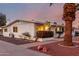 Charming one story home with a well manicured lawn, colorful accents and an ample driveway at 10516 W Peoria Ave, Sun City, AZ 85351