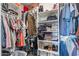 Walk-in closet with ample storage space, shelving, and hanging rods for organized living at 1124 E Jahns Dr, Casa Grande, AZ 85122