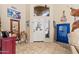 Spacious foyer with a high ceiling, tiled flooring, and eclectic western decor at 1124 E Jahns Dr, Casa Grande, AZ 85122