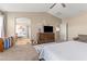 Bright main bedroom offering glimpses into a spacious bathroom and abundant storage space at 1124 E Jahns Dr, Casa Grande, AZ 85122