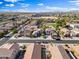 A street-view showcases well-maintained homes, sidewalks, and street parking enhancing curb appeal at 1124 E Jahns Dr, Casa Grande, AZ 85122
