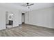 Bright main bedroom featuring neutral walls, wood-look floors, and ensuite bathroom at 11257 E Reginald Ave, Mesa, AZ 85212