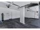 The garage has a black-stained concrete floor and an insulated garage door at 11257 E Reginald Ave, Mesa, AZ 85212
