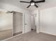 Well-lit bedroom with new carpet, an expansive closet, and a neutral color scheme that invites relaxation at 1621 N Chippewa Dr, Chandler, AZ 85224