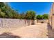 Private backyard with desert landscaping, brick pavers, and perimeter wall at 1831 N 77Th St, Scottsdale, AZ 85257
