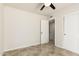 Neutral bedroom with modern light fixture, door and closet at 1831 N 77Th St, Scottsdale, AZ 85257