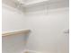 Walk-in closet featuring shelving and rod for organized storage at 1831 N 77Th St, Scottsdale, AZ 85257