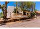 Desert landscaped home with a stucco wall exterior and a brown tile roof at 1831 N 77Th St, Scottsdale, AZ 85257