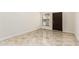 Bright living room with tile floors, modern paint, a window and dark trim at 1831 N 77Th St, Scottsdale, AZ 85257