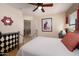 Comfortable bedroom features stylish accents, patterned decorations, and a ceiling fan at 18375 E San Ignacio Ct, Gold Canyon, AZ 85118