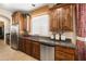 Kitchen area featuring stainless steel appliances, granite countertops, and plentiful wood cabinetry at 18375 E San Ignacio Ct, Gold Canyon, AZ 85118