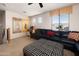 Spacious living room featuring a ceiling fan, carpet flooring, and comfortable seating with a view at 18375 E San Ignacio Ct, Gold Canyon, AZ 85118