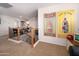 This spacious loft showcases a railing, artwork, and plenty of natural light at 18375 E San Ignacio Ct, Gold Canyon, AZ 85118