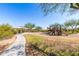 Scenic playground featuring a gazebo and slides, with beautiful desert landscaping at 18375 E San Ignacio Ct, Gold Canyon, AZ 85118