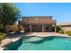 Inviting backyard pool with a spacious patio, perfect for outdoor entertaining and relaxation at 18375 E San Ignacio Ct, Gold Canyon, AZ 85118